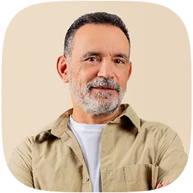 A smiling man in his mid-50s